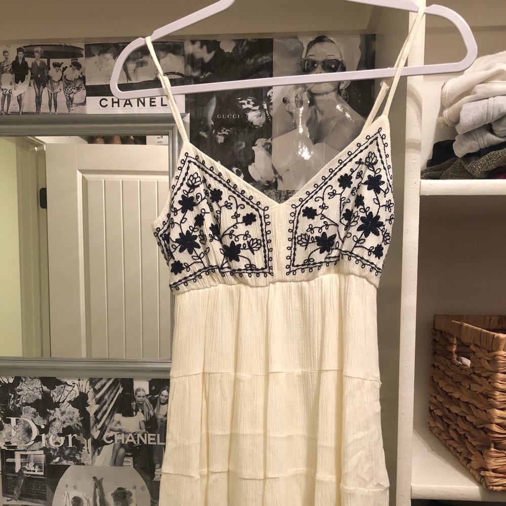Ivory dress with blue stitching details
